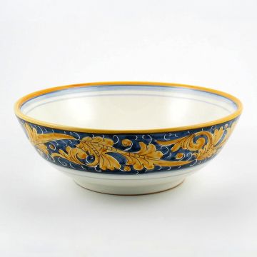 Italian serving bowl from the Rinascimento Blu e Giallo collection handmade by Ceramiche Rampini in Gubbio, Italy