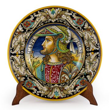 Italian wall plate featuring a Renaissance-style portrait of a warrior with long hair handmade by Alvaro Binaglia in Deruta Italy - main image