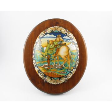 Italian oval plaque featuring a Renaissance-style portrait of a knight handmade by Alvaro Binaglia in Deruta Italy - main image