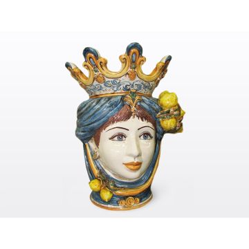Sicilian Moorish head with lemons. It features a female character decorated in rich shades of blue and orange. It is handcrafted in Caltagirone, Italy. Large