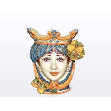 Sicilian Moorish head with lemons. It features a female character decorated in rich shades of blue and orange. It is handcrafted in Caltagirone, Italy. Small