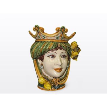 Sicilian Moorish head with lemons. It features a female character decorated in rich shades of green and orange. It is handcrafted in Caltagirone, Italy. Small