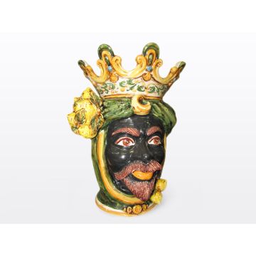 Sicilian head with lemons. It features a Moorish character decorated in rich shades of green and orange. It is handcrafted in Caltagirone, Italy. Large