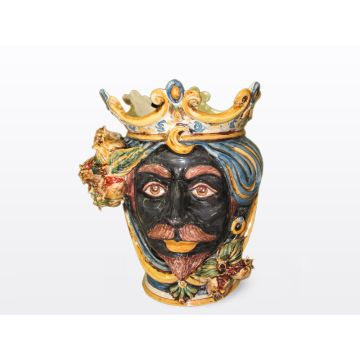Sicilian head with pomegranates. It features a Moorish character decorated in rich shades of blue and orange. It is handcrafted in Caltagirone, Italy. Small