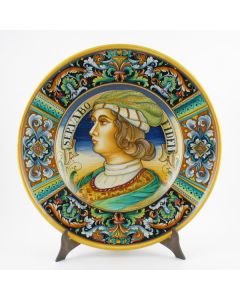 Italian wall plate featuring a Renaissance-style portrait of Lorenzo handmade by Alvaro Binaglia in Deruta Italy - main image