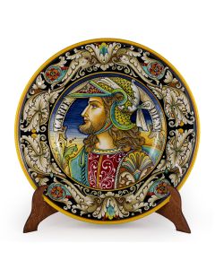 Italian wall plate featuring a Renaissance-style portrait of a warrior with long hair handmade by Alvaro Binaglia in Deruta Italy - main image