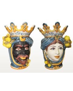 Pair of Sicilian Moorish heads with lemons. They feature a man and a woman decorated in rich shades of blue and orange. Handcrafted in Caltagirone, Italy.