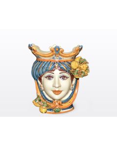 Sicilian Moorish head with lemons. It features a female character decorated in rich shades of blue and orange. It is handcrafted in Caltagirone, Italy. Small