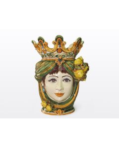 Sicilian Moorish head with lemons. It features a female character decorated in rich shades of green and orange. It is handcrafted in Caltagirone, Italy. Large