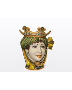 Sicilian Moorish head with lemons. It features a female character decorated in rich shades of green and orange. It is handcrafted in Caltagirone, Italy. Small