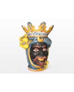 Sicilian head with lemons. It features a Moorish character decorated in rich shades of blue and orange. It is handcrafted in Caltagirone, Italy. Large