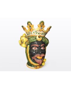 Sicilian head with lemons. It features a Moorish character decorated in rich shades of green and orange. It is handcrafted in Caltagirone, Italy. Large
