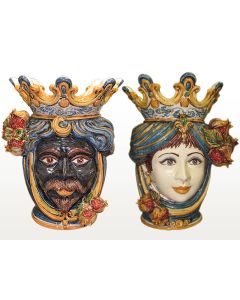 Pair of Sicilian Moorish heads with pomegranates. They feature a man and a woman decorated in rich shades of blue and orange. Handcrafted in Caltagirone, Italy.