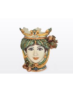 Sicilian Moorish head with pomegranates. It features a female character decorated in rich shades of green and orange. It is handcrafted in Caltagirone, Italy. Small
