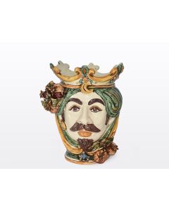 Sicilian Moorish head with pomegranates. It features a male character decorated in rich shades of green and orange. It is handcrafted in Caltagirone, Italy. Small