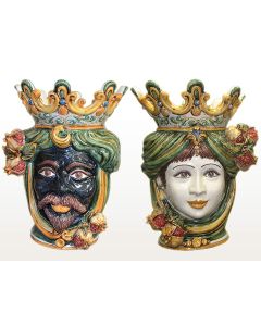 Pair of Sicilian Moorish heads with pomegranates. They feature a man and a woman decorated in rich shades of green and orange. Handcrafted in Caltagirone, Italy.